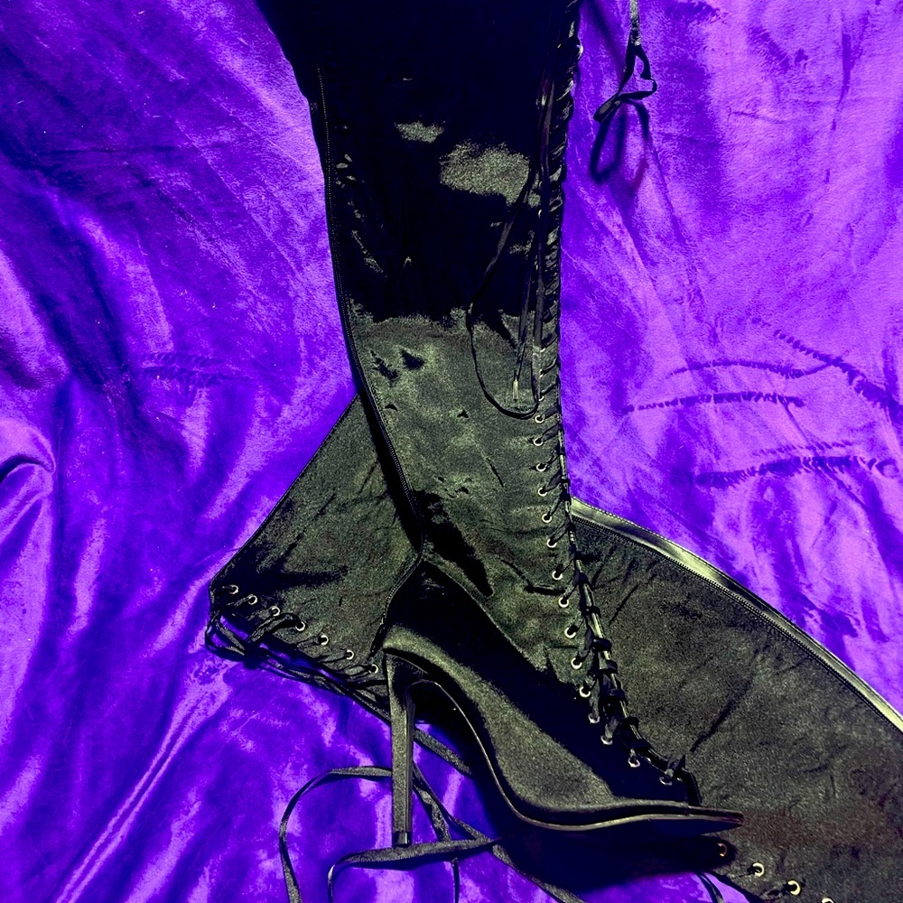Beautiful above knee satin lace up boots.
